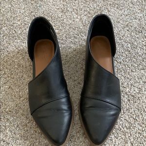 Black leather flats